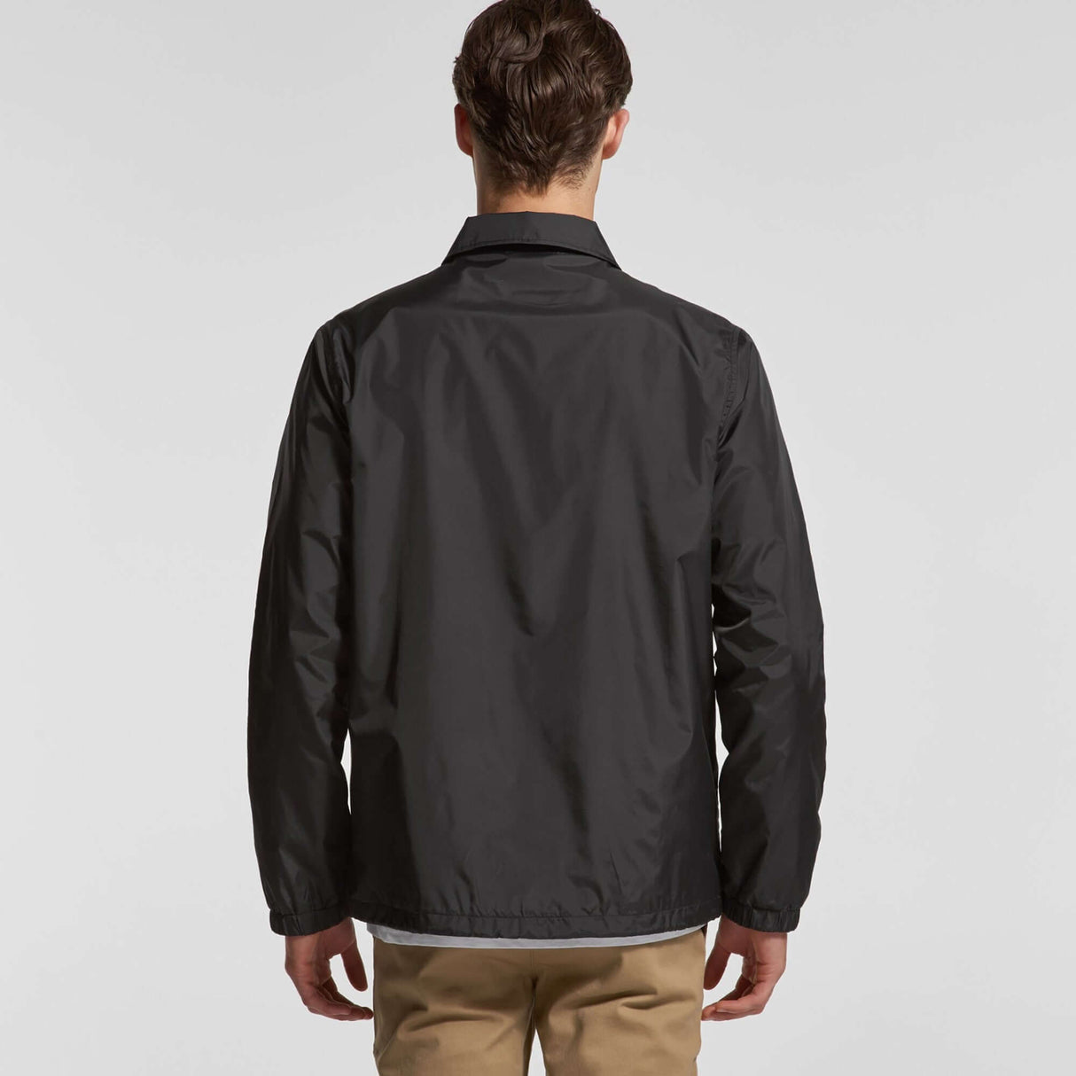 Black Cape Kings customisable coach jacket from the back, great anti hair and warm winter clothing, perfect for barbers
