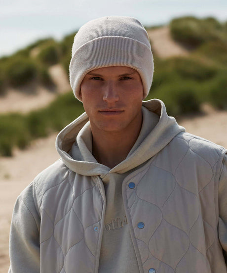 Man wearing Cape kings customisable Original Cuffed Beanie.